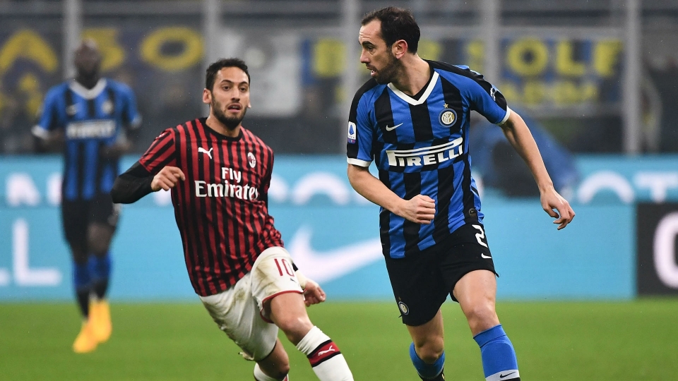Diego Godin Hakan Calhanoglu Inter Milan