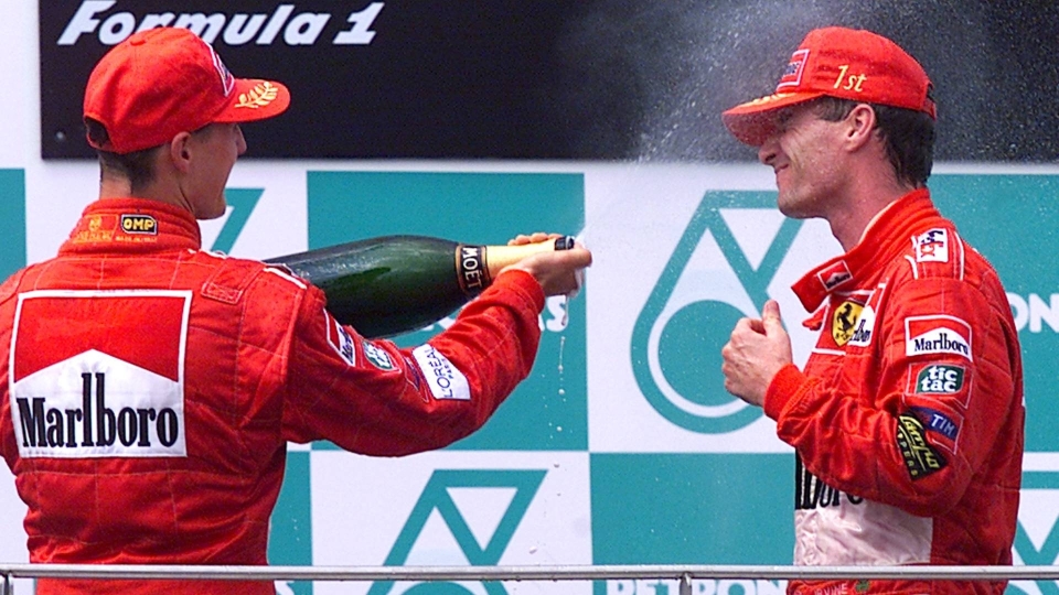 Eddie Irvine e Michael Schumacher