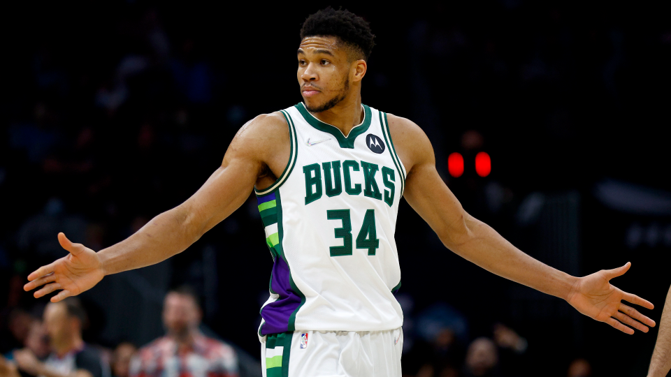 Giannis Antetokounmpo of the Milwaukee Bucks reacts following a play during the second half of the game against the Charlotte Hornets Giannis Antetokounmpo