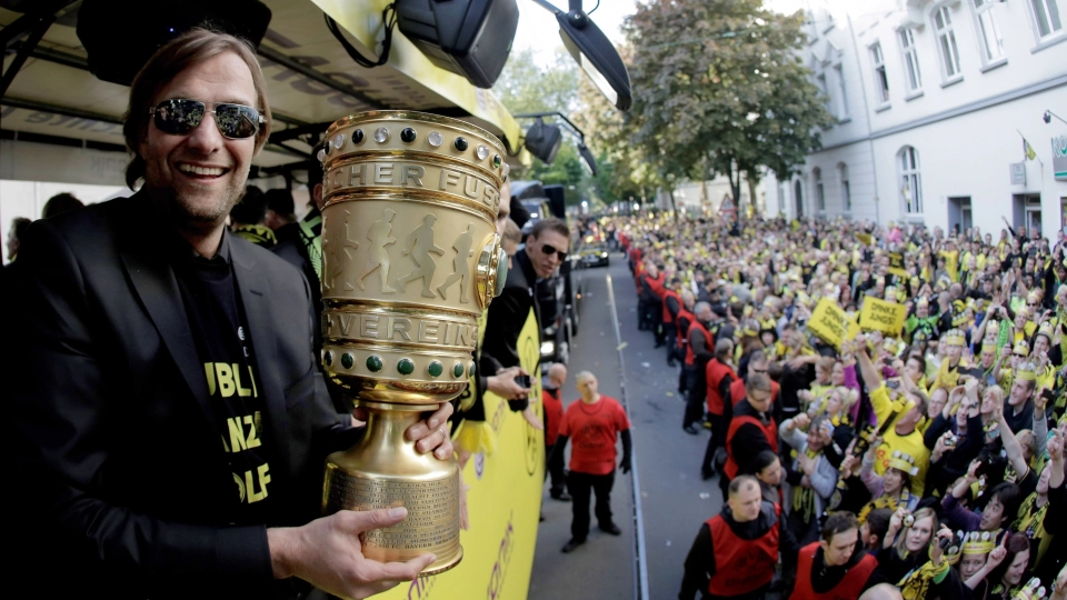 Jurgen Klopp with German Cup in 2012 with Dortmund fans
