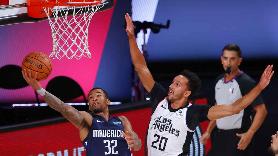 Le foto di Mavericks-Clippers 135-133