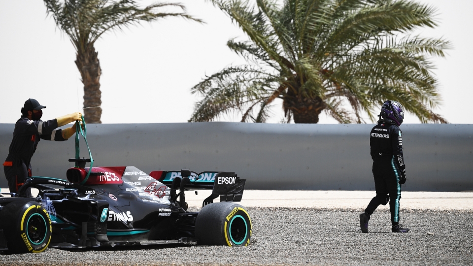 Lewis Hamilton walks away from his Mercedes