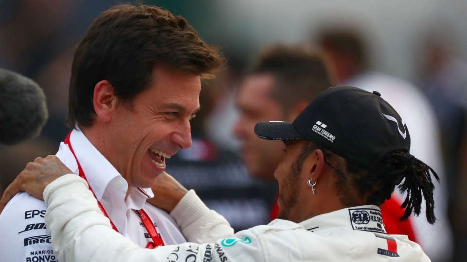 Mercedes team principal Toto Wolff (left) and driver Lewis Hamilton WolffHamiltonCropped